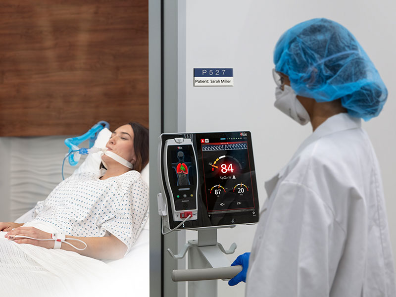 Masimo - Doctor outside of patient room monitoring via Root device
